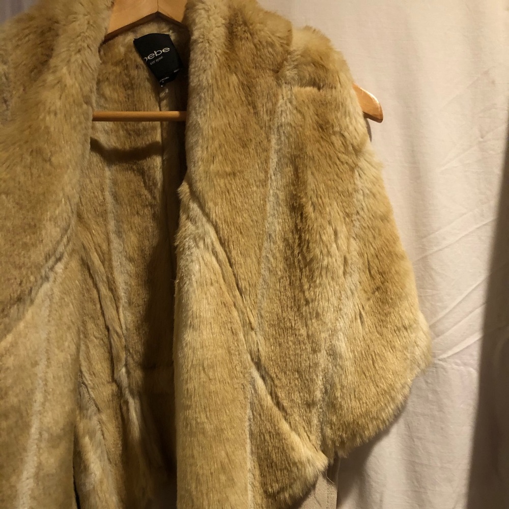 Tan sleeveless vest